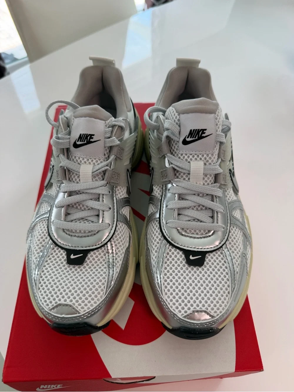 Women Nike V2K sneakers.